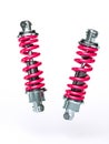 pair of car shock absorbers over white Royalty Free Stock Photo