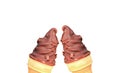 Chocolate Coated Soft Serve Ice Cream Cones Clinking on White Background Royalty Free Stock Photo