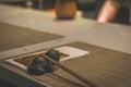 A pair of chopsticks on a table in a restaurant