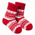 Pair of Christmas Socks Red and White Patterned on Plain Background Royalty Free Stock Photo