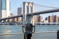 Pair of city binoculars near a railing, providing a stunning view of the New York skyline Royalty Free Stock Photo