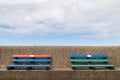 Pair of colourful benches on Wallasey promenade