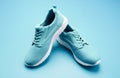 pair of comfortable sport shoes. sporty blue sneakers. shoes on blue background. Royalty Free Stock Photo
