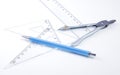 Pair of compasses drawing circle on a paper Royalty Free Stock Photo