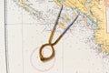 Pair of compasses for navigation on a sea map Royalty Free Stock Photo