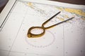 Pair of compasses for navigation on a sea map Royalty Free Stock Photo