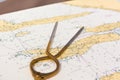 Pair of compasses for navigation on a sea map Royalty Free Stock Photo