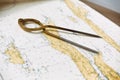 Pair of compasses for navigation on a sea map Royalty Free Stock Photo