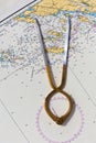 Pair of compasses for navigation on a sea map Royalty Free Stock Photo