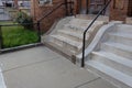 Pair of concrete stairs with metal pipe railings, residential brownstone Royalty Free Stock Photo