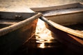 Pair of conjunct boats on a lake during a golden sunset Royalty Free Stock Photo