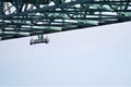 Two bridge workers silhouetted under bridge deck slab Royalty Free Stock Photo