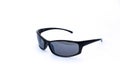Pair of cool, macho, masculine, black sun glasses, side view on white background