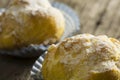 Pair of cream puffs filled with cream Royalty Free Stock Photo