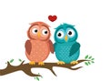 A pair of cute owlet sitting on a branch. Owls in love hearts Royalty Free Stock Photo