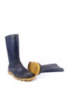 Pair of dark blue dirty rubber boots Royalty Free Stock Photo