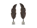Pair of Decorative Bronze Feather Sculptures on Marble Bases Royalty Free Stock Photo