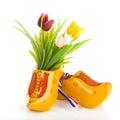 Pair of Dutch wooden shoes with tulips Royalty Free Stock Photo