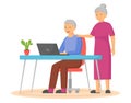 Pair of elderly man and woman surfing internet together. Happy old couple watching video on laptop Royalty Free Stock Photo