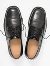 Pair of elegant mens shoes. Fashion black shiny leather. Isolated on a white background. Top view Royalty Free Stock Photo