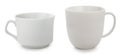 Pair of empty porcelain coffee cups isolated on a white background Royalty Free Stock Photo