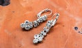 pair of a fashion silver earrings with precious stones