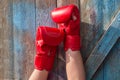 Pair of female hands in red boxing gloves Royalty Free Stock Photo