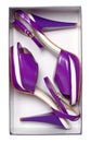 Pair of female violet summer shoes in box Royalty Free Stock Photo