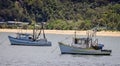 Pair of fishing boats moored in bay at Patonga Beach, New South Wales, Australia