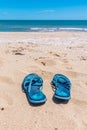 A pair of flip flops on a sandy beach in Bulgaria Royalty Free Stock Photo