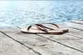 A pair of flipflops near lake