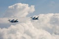 Pair of the Flying airplane Be-103 in clouds