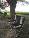 A pair of folding chairs in a nature-themed restaurant Royalty Free Stock Photo