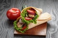 Pair of fresh juicy tortilla wraps with chicken