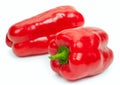 Pair fresh red bell pepper, isolated on white background, close-up