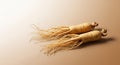Pair of Ginseng Roots on Beige Background Royalty Free Stock Photo