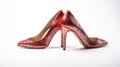 a pair of glamorous, sparkling high heel shoes, of those worn on the red carpet, against a pristine white background to Royalty Free Stock Photo