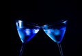 A pair of glasses of fresh cocktail with ice make cheers Royalty Free Stock Photo