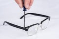 Pair of glasses are tighted and repaired Royalty Free Stock Photo