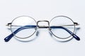 A pair of glasses on a white surface Royalty Free Stock Photo