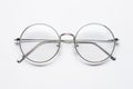 A pair of glasses on a white surface Royalty Free Stock Photo