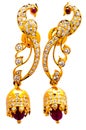 a pair of gold and ruby stone earrings, designed with the motif of peacock Royalty Free Stock Photo