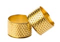 Pair of gold thimbles Royalty Free Stock Photo