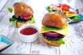 A pair of gourmet burgers Royalty Free Stock Photo