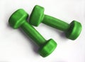 Pair of green fitness dumbbells