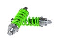 pair of green shock absorber isolated on white Royalty Free Stock Photo