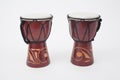 A pair of handmade wooden African hand drums