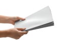 A pair of hands carefully holding a stack of blank paper sheets Royalty Free Stock Photo