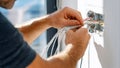 Electrician wiring new electrical system in modern home Royalty Free Stock Photo