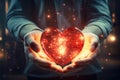 A pair of hands, strong and caring, gently support a radiant red heart, surrounded by a soft glow that whispers of love